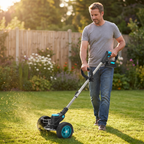 Man standing fully upright walking the Autonix GT-20 across a lawn, cut grass spraying from the blade